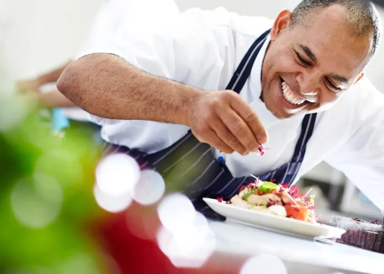 a caterer working within a care home preparing a meal