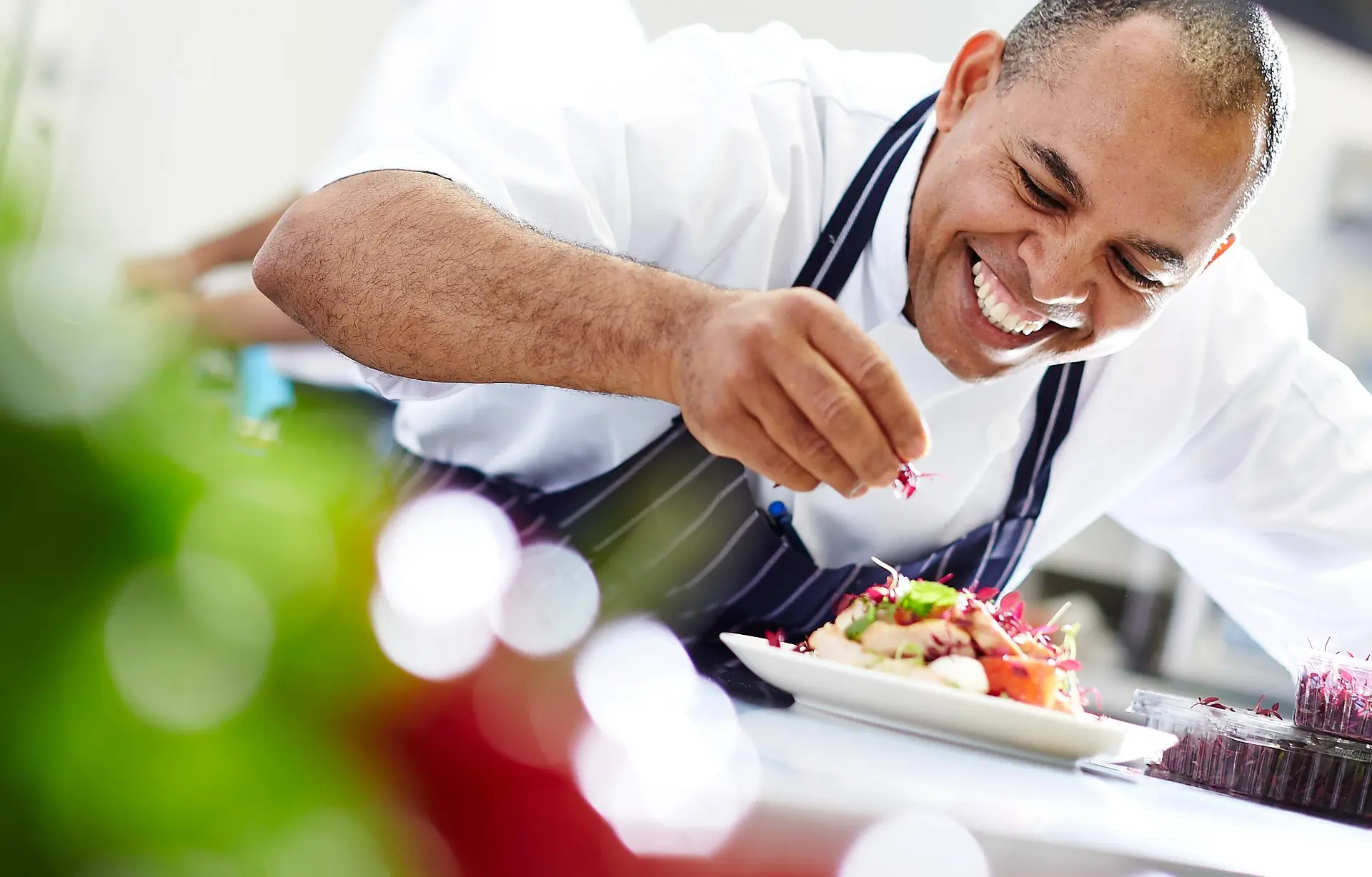 a caterer working within a care home preparing a meal