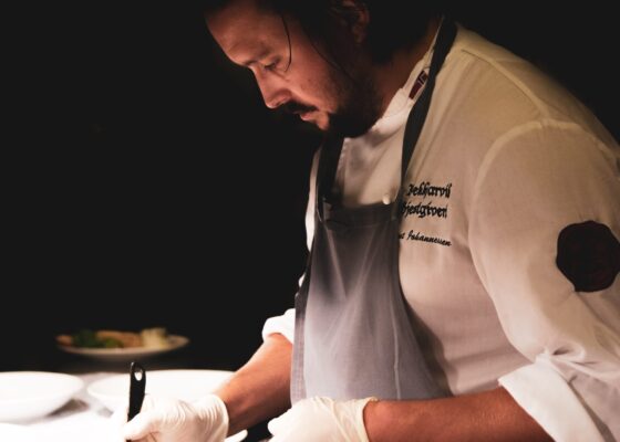 a chef at his work station wondering about ways to advance as a care home chef