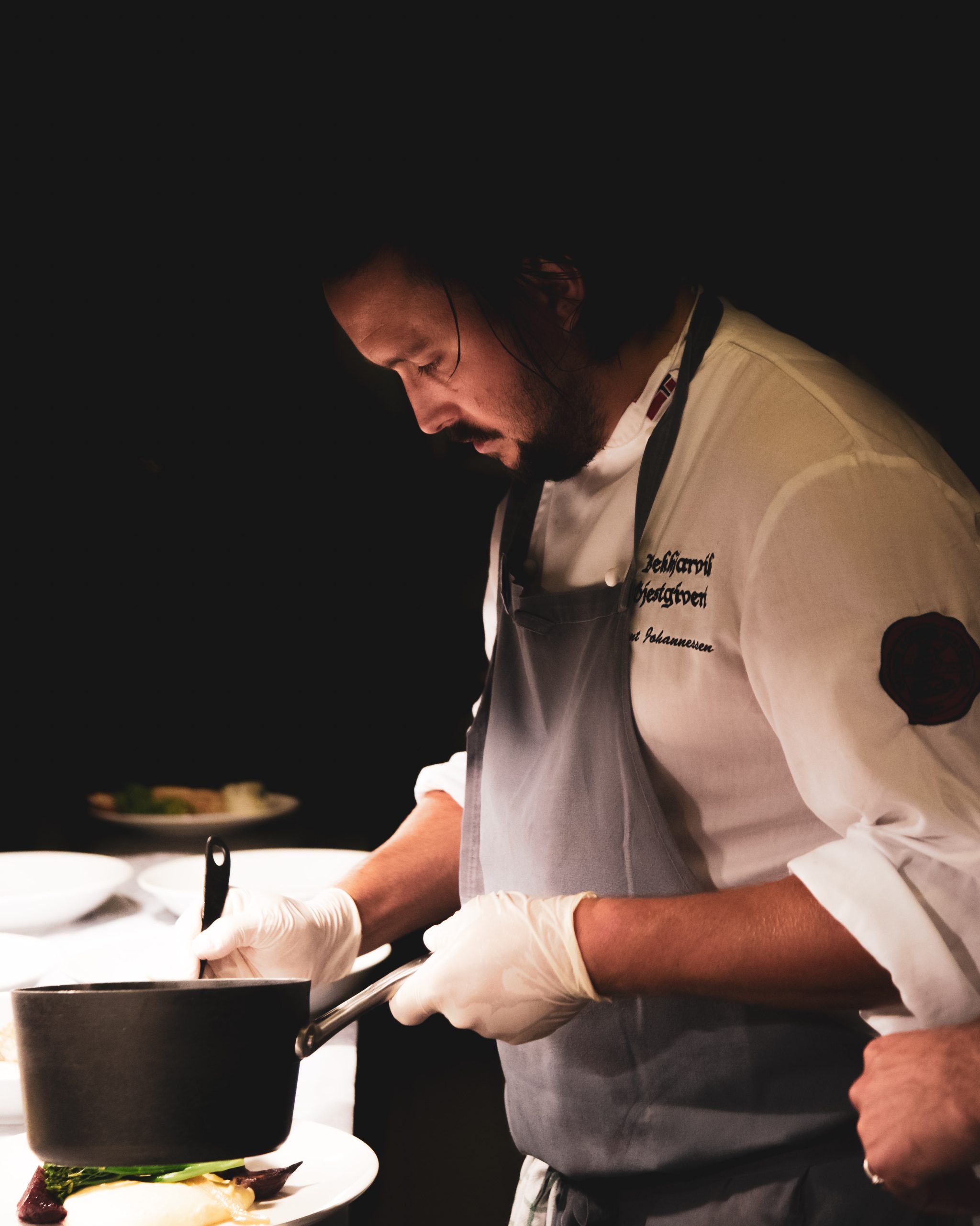 a chef at his work station wondering about ways to advance as a care home chef