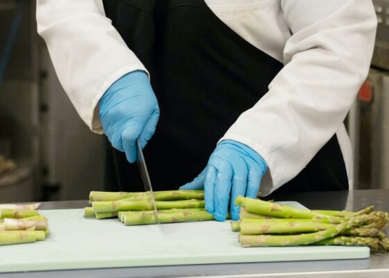 a chef chopping veg recruited for a career in catering for the elderly