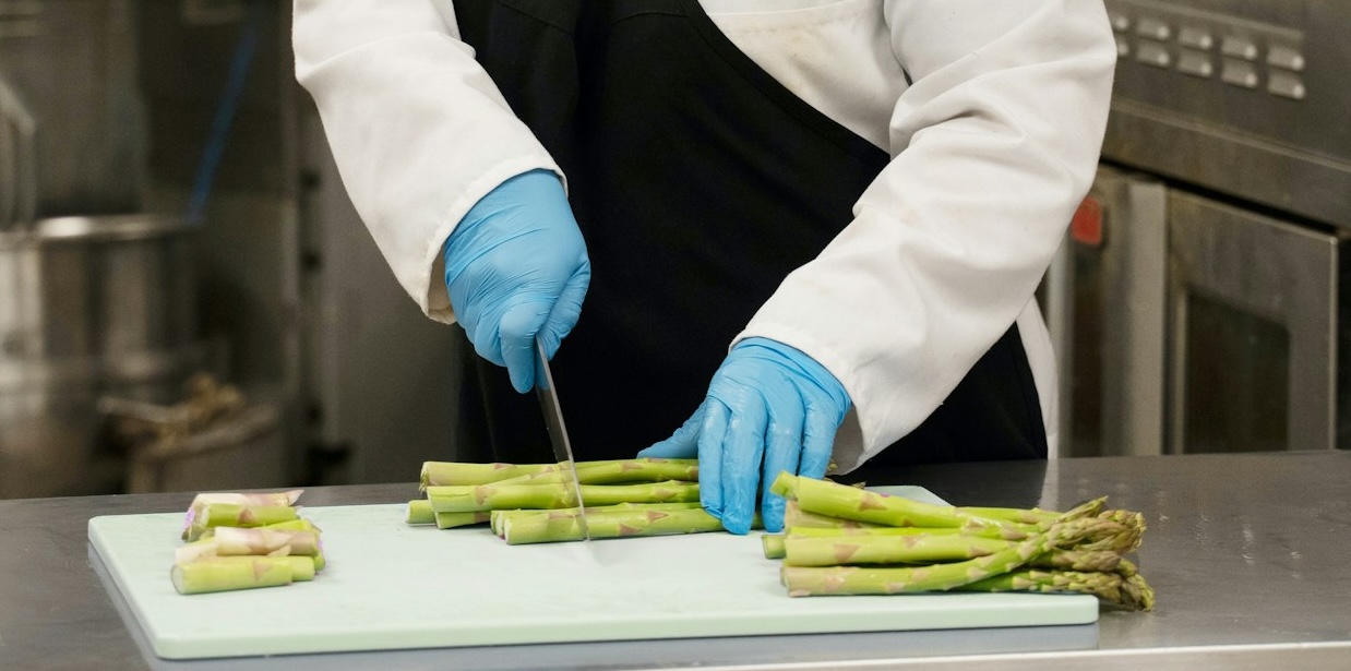 a chef chopping veg recruited for a career in catering for the elderly