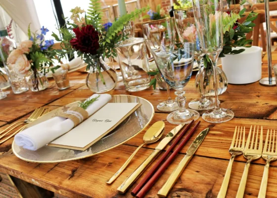 A fancy looking table laid out with fine dining ware.